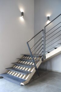 Steel staircase in the interior of a new building